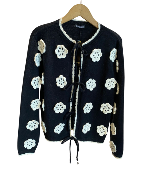 Gilet met strik en bloemen